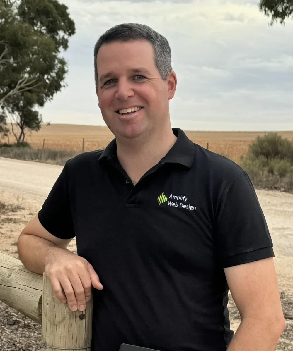 Amplify Web Design's SEO Expert Luke Bayly standing in a paddock near Murray Bridge